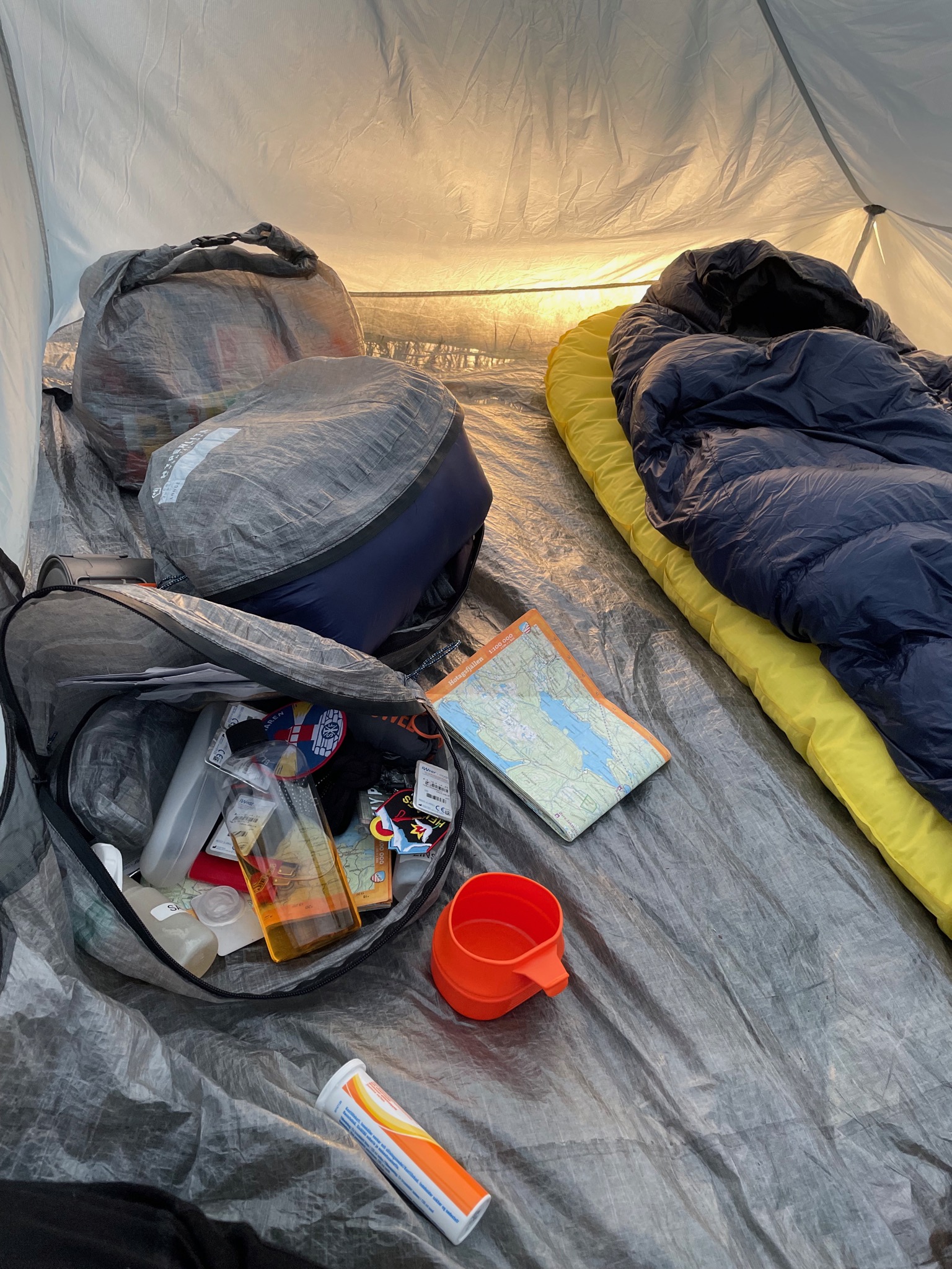 Tarptent Stratospire Li, interior, with my sleeping bag and storage bags open.